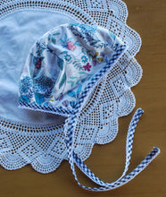 Load image into Gallery viewer, Reversible Riverstone Bonnet 12-18 month size
