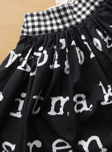 Load image into Gallery viewer, Hazel Skirt Size 5 Black and White lettering print
